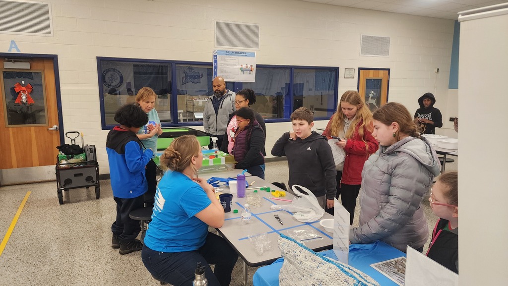 Families at the Clean Virginia Waterways table