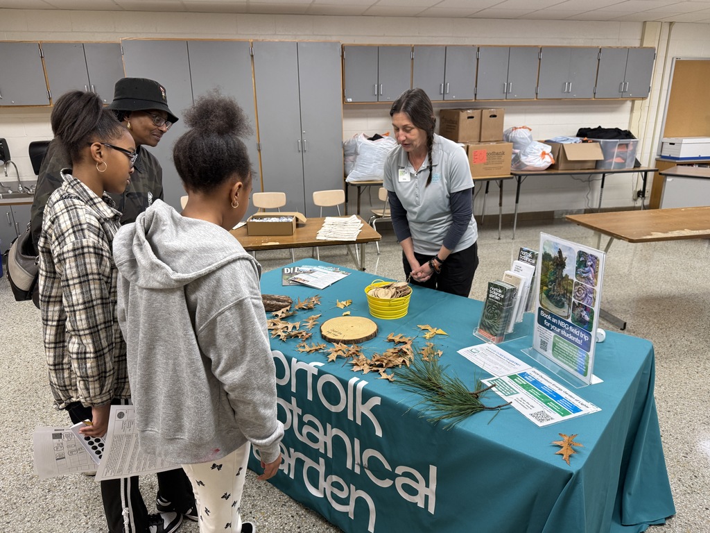 Norfolk Botanical Gardens table with students and different leaves