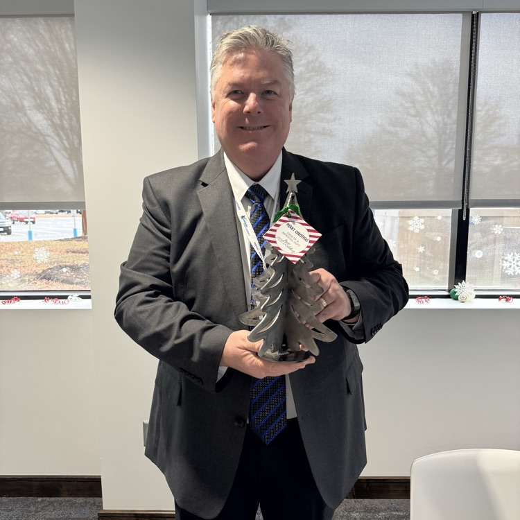 dr. cotton with a Christmas tree.