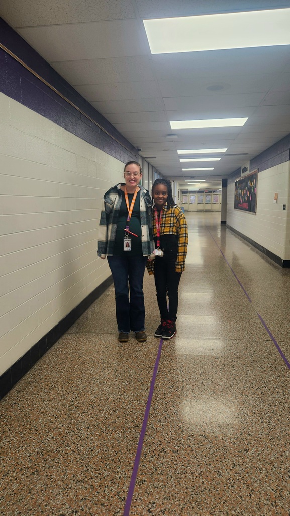 a teacher and a student wearing flannel