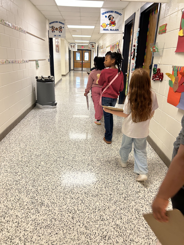 students hunting for scavenger hunt clues