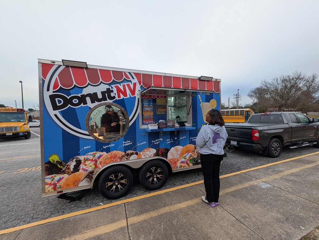 teacher waiting to order donuts at a food truck