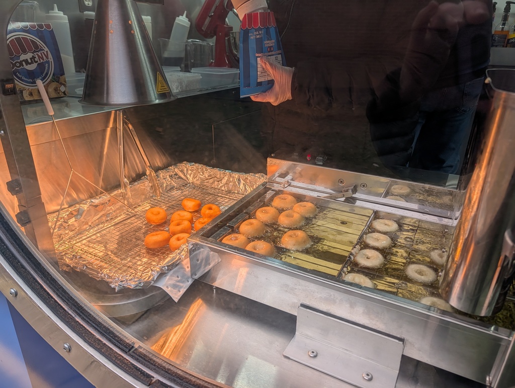 fresh mini donuts being made