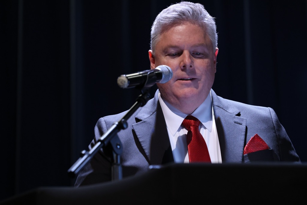 superintendent speaking at podium