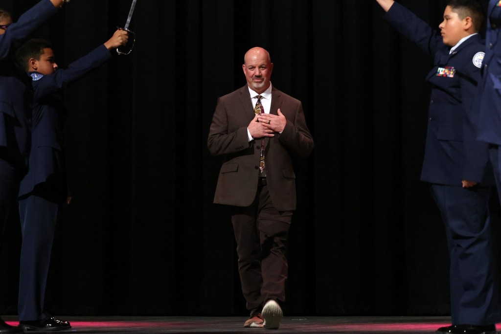 toy covering his heart