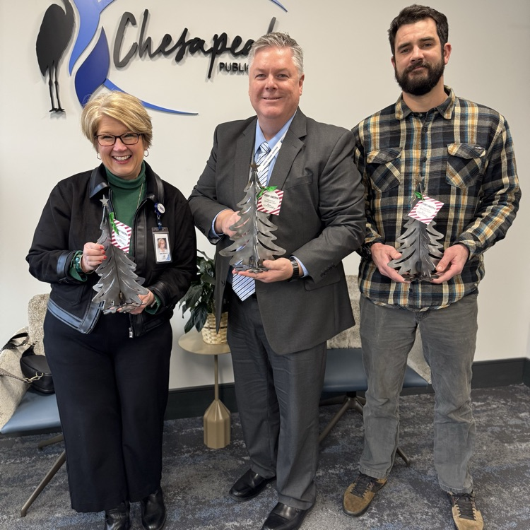 Dr. Kitchens, Dr. Cotton and Mr. Sommers holding trees