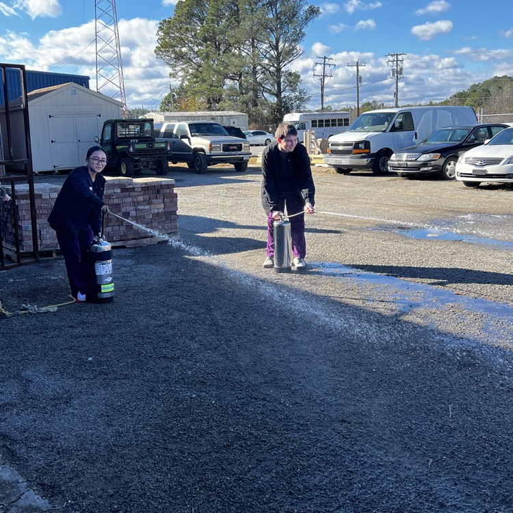 using a fire extinguisher 