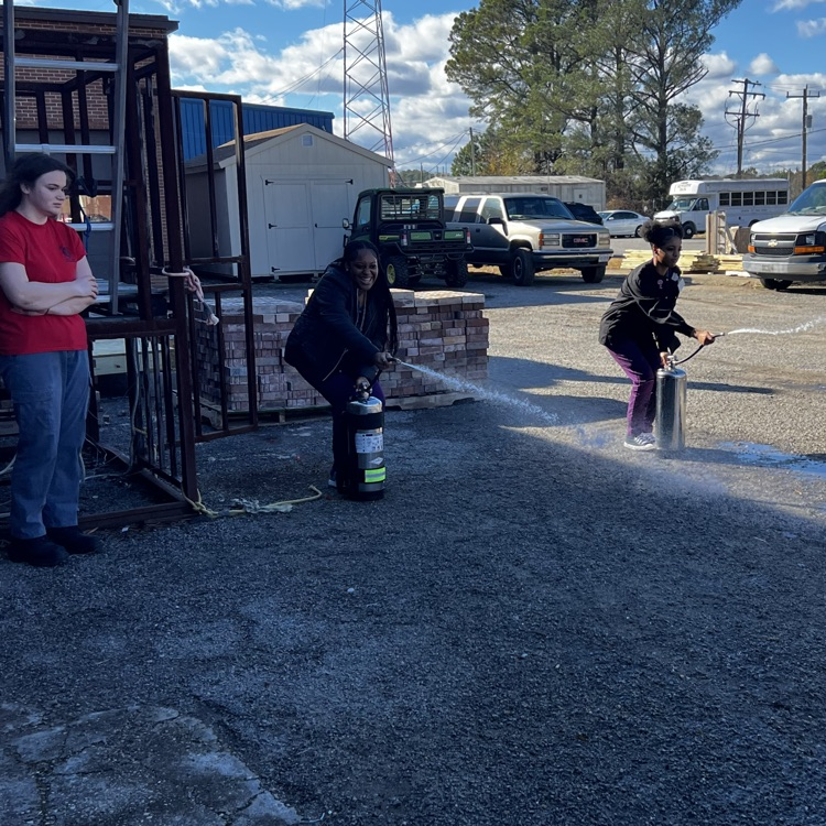 using a fire extinguisher 