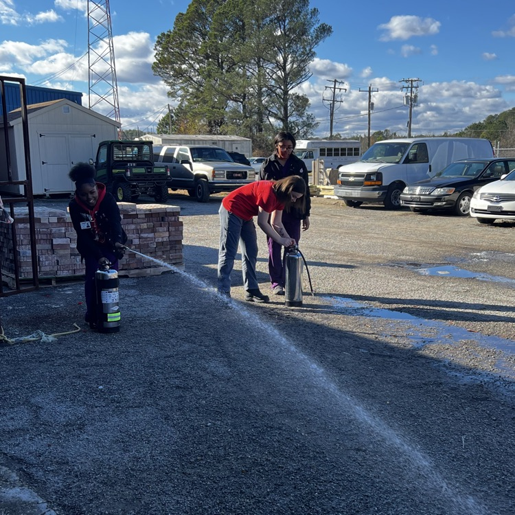 using a fire extinguisher 