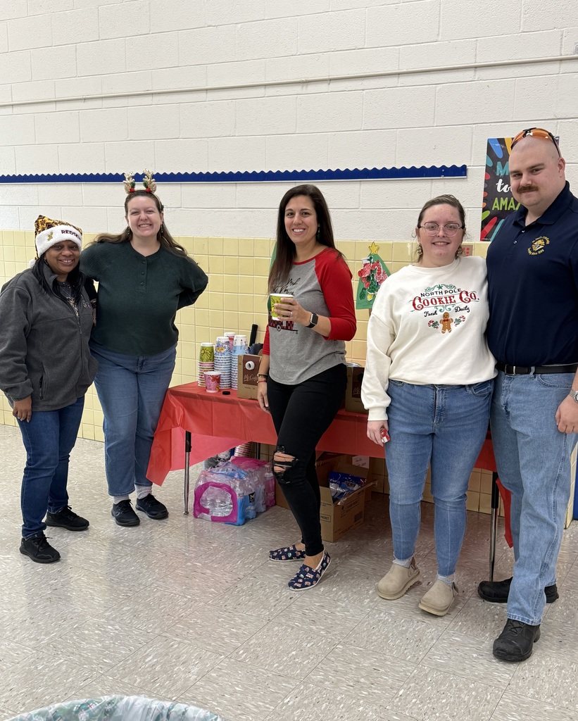 Staff helping with Santa Breakfast