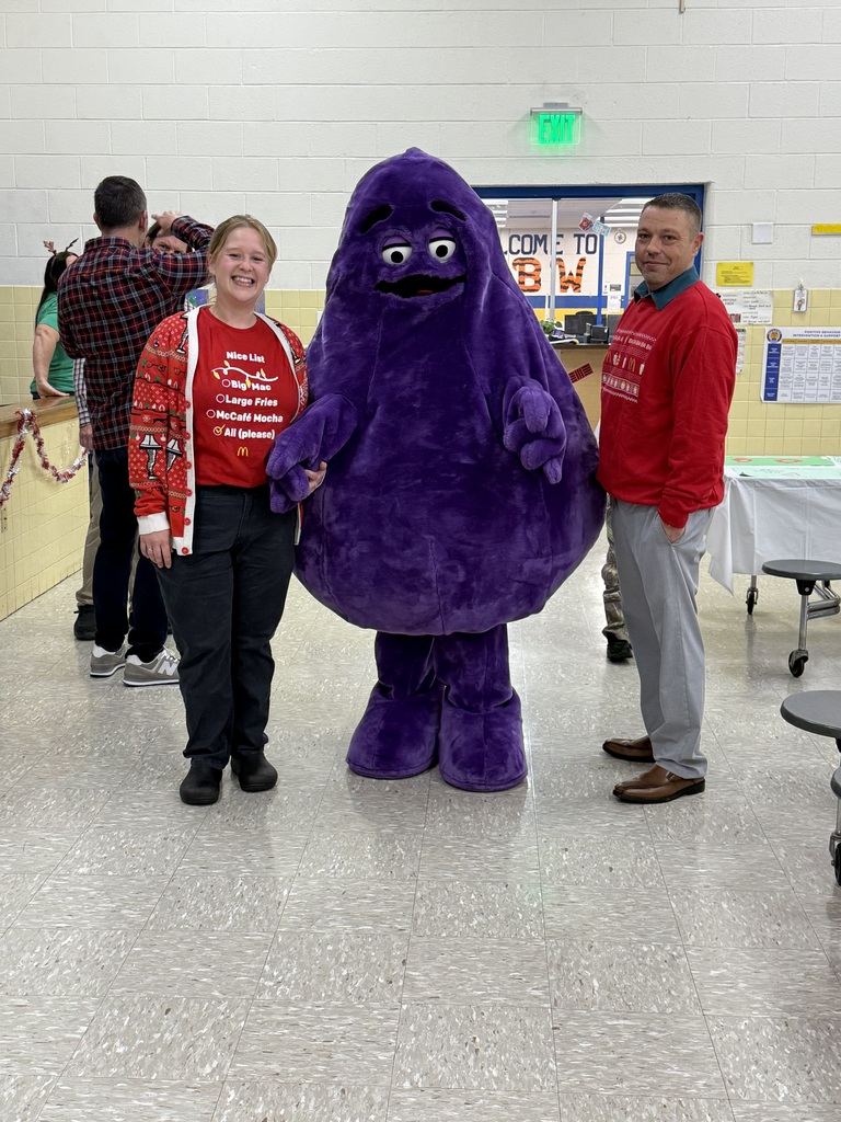 McDonalds members with Grimace