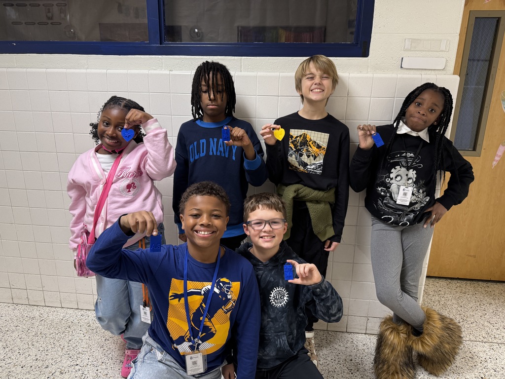 group of 4th graders with brag tags