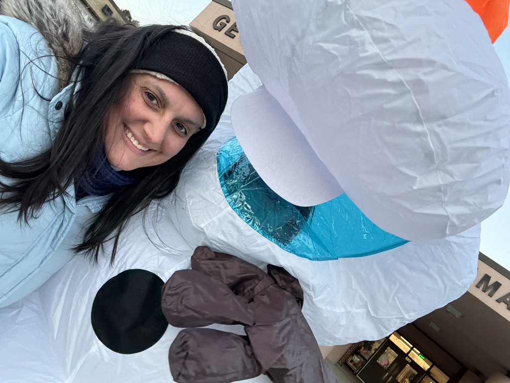 Mrs. Gurkin dressed as Olaf posing with Mrs. Yohe