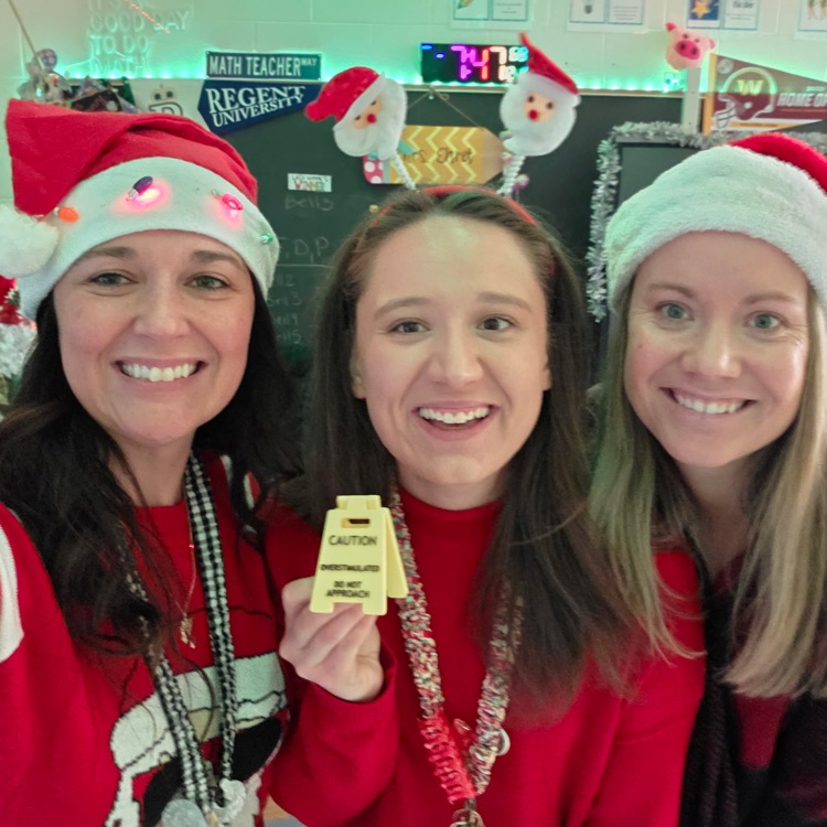 teachers dressed as Santa 
