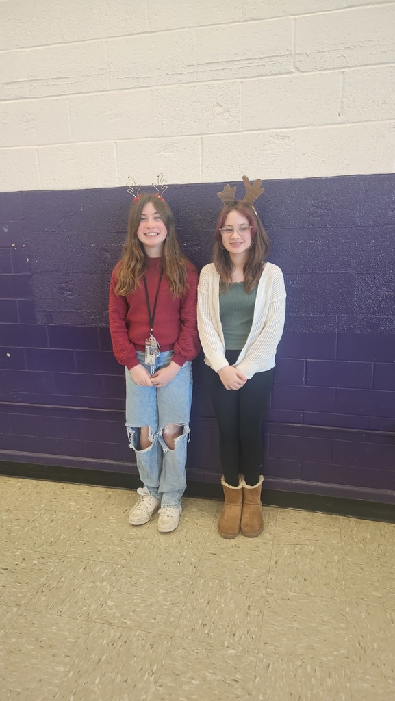 Two students dressed as reindders
