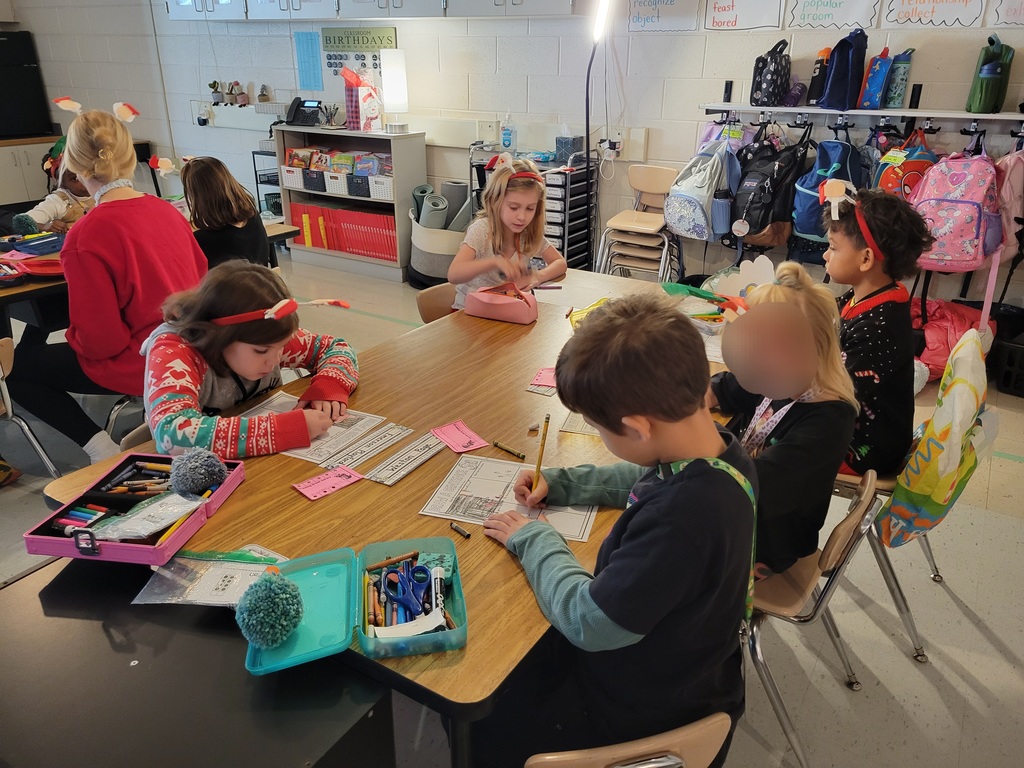 Holiday party time with Miss Stafford and her little elves.