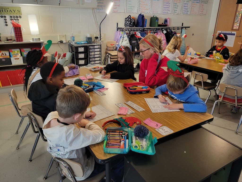 Holiday party time with Miss Stafford and her little elves.