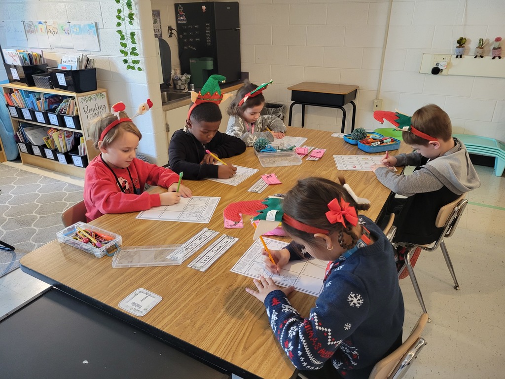 Holiday party time with Miss Stafford and her little elves.