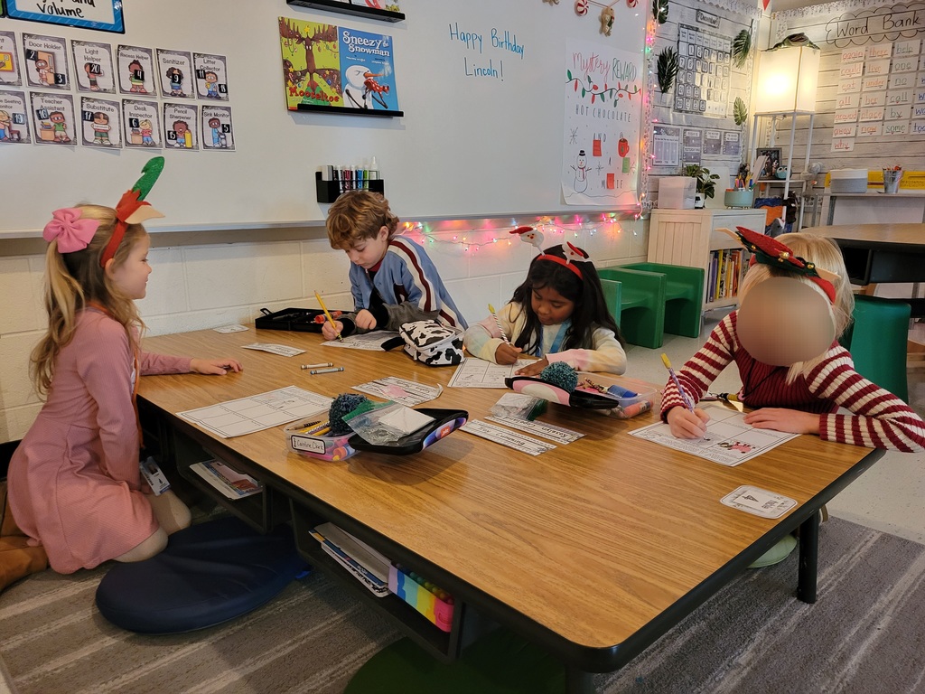 Holiday party time with Miss Stafford and her little elves.