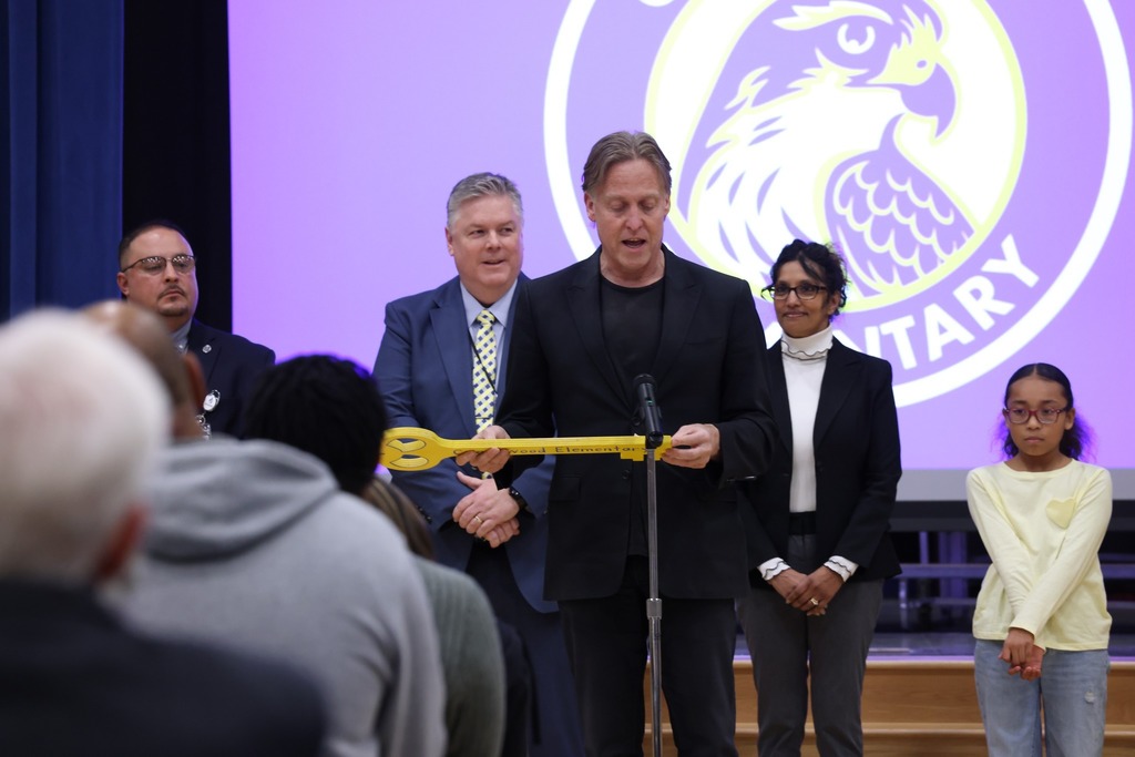 architech reading from key at dedication