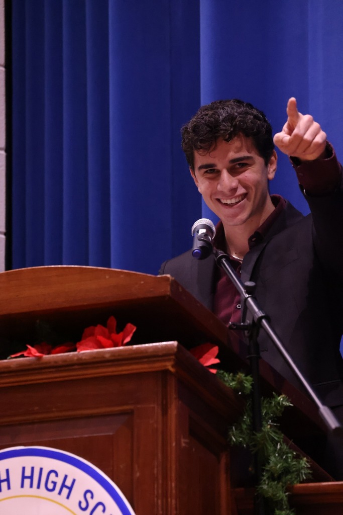 Student speaking to the crowd.