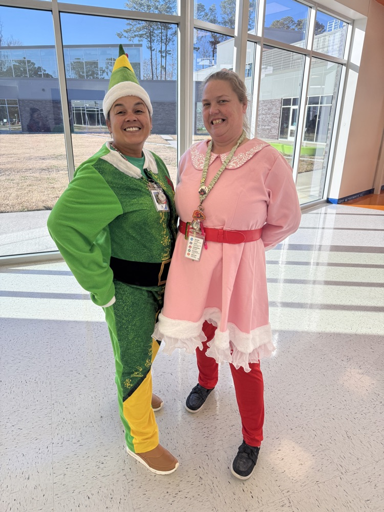 teachers smiling for the holidays