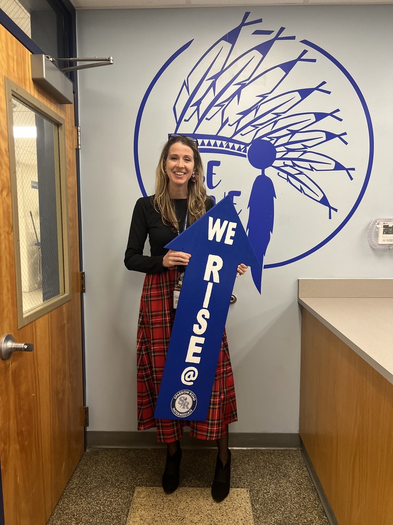 Mrs. Blair with the I RISE sign