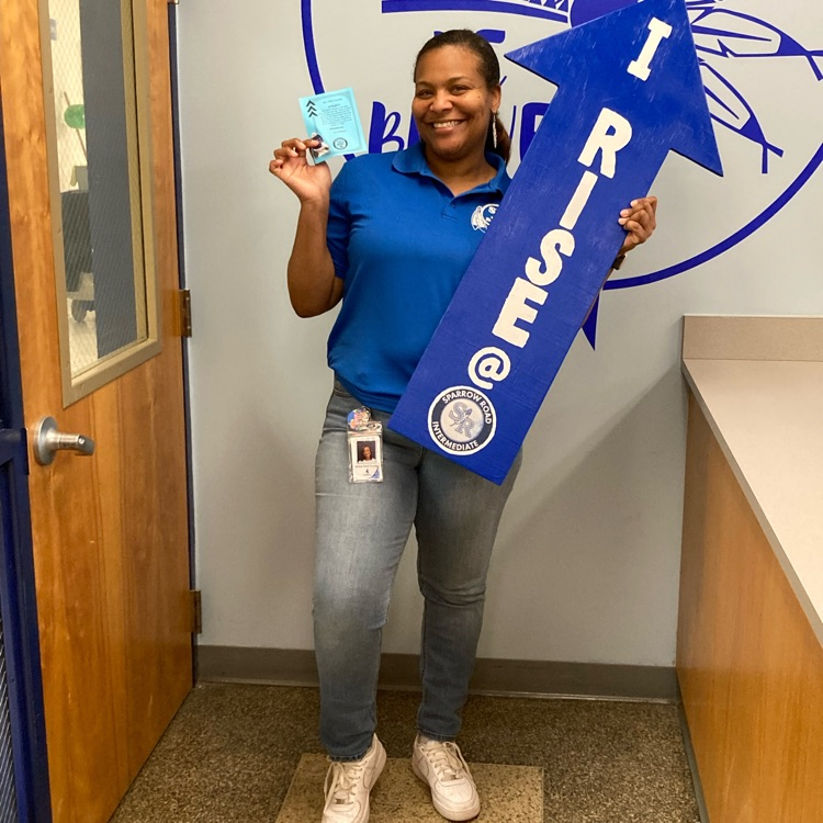 Ms Clark Thomas with RISE arrow 