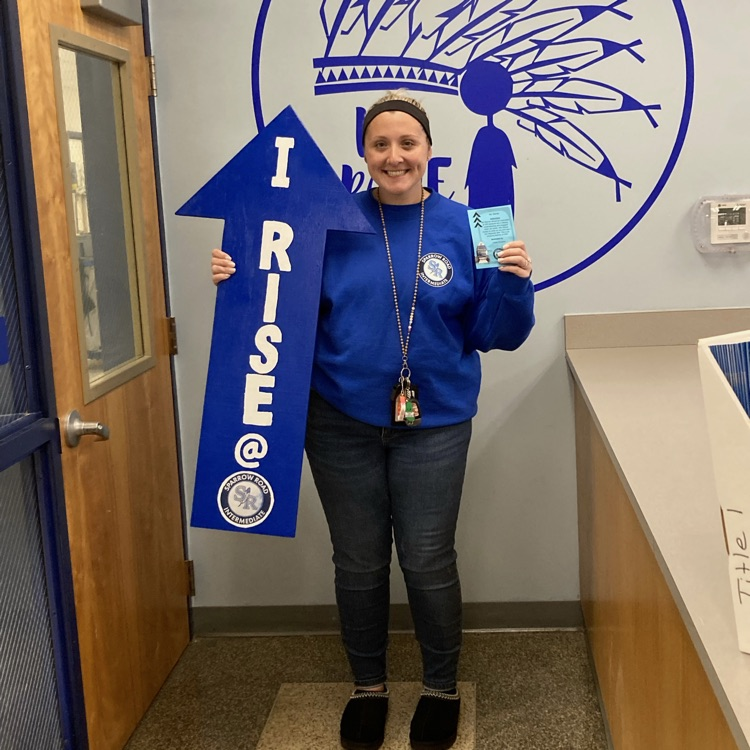 Ms Warner with RISE arrow 