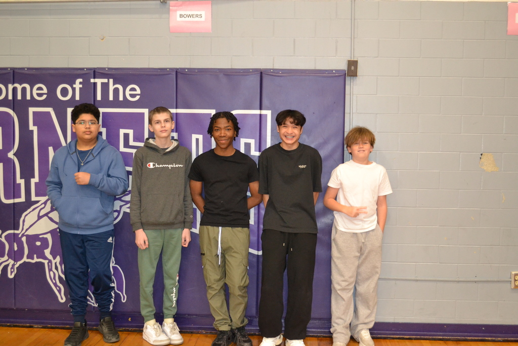 Four boys wearing their sneakers and joggers for moving and grooving day!