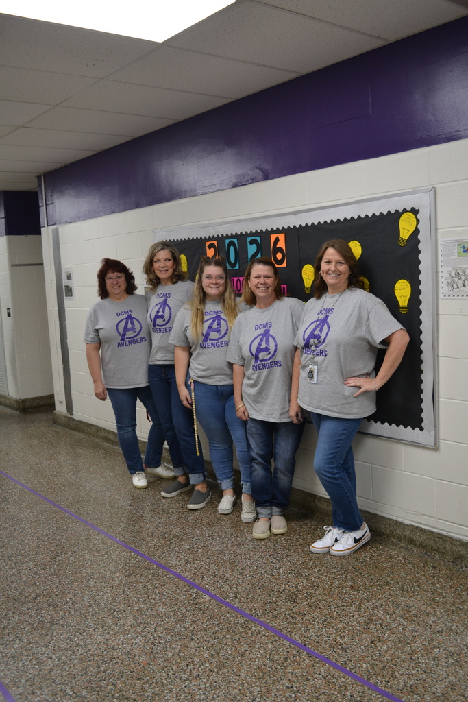 all the avengers teachers wearing avengers shirts for Twin day