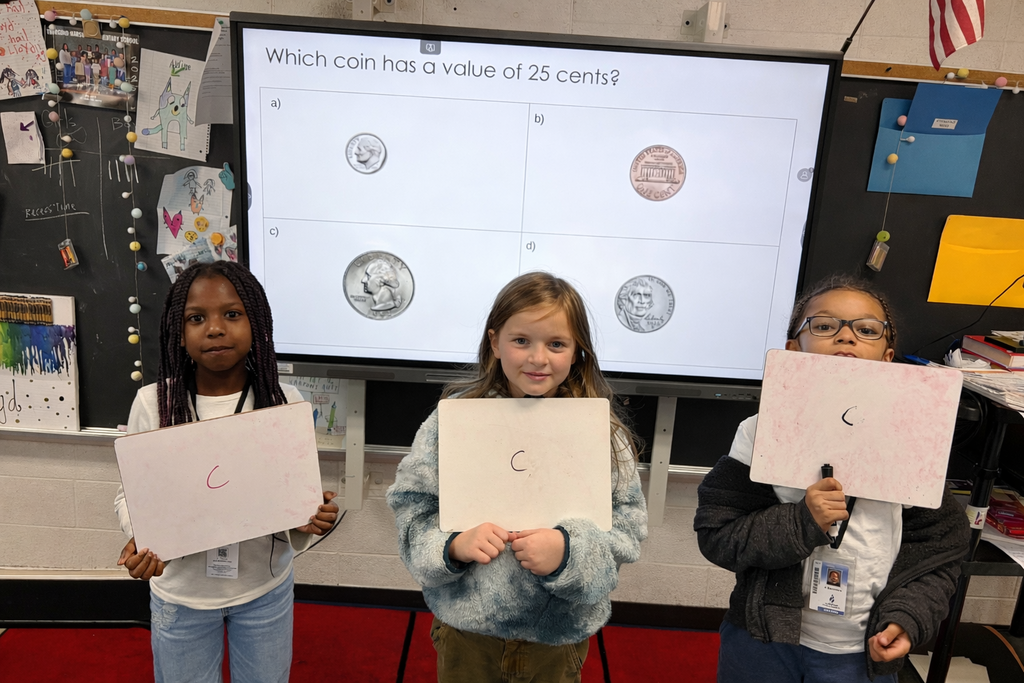 Ms. Lloyd's class are learning about coins and the value of a quarter.
