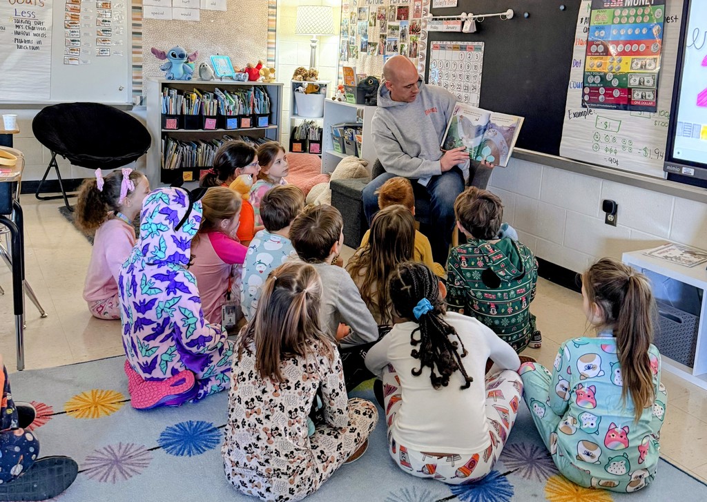 Mrs. Charlton's class had a special guest reader today, Mr. Heberling. Her students thoroughly enjoyed having him as their guest and they loved the story that he read.
