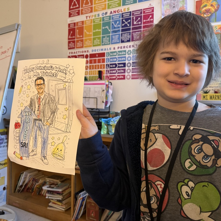 student holding coloring page with Mr. Triolet