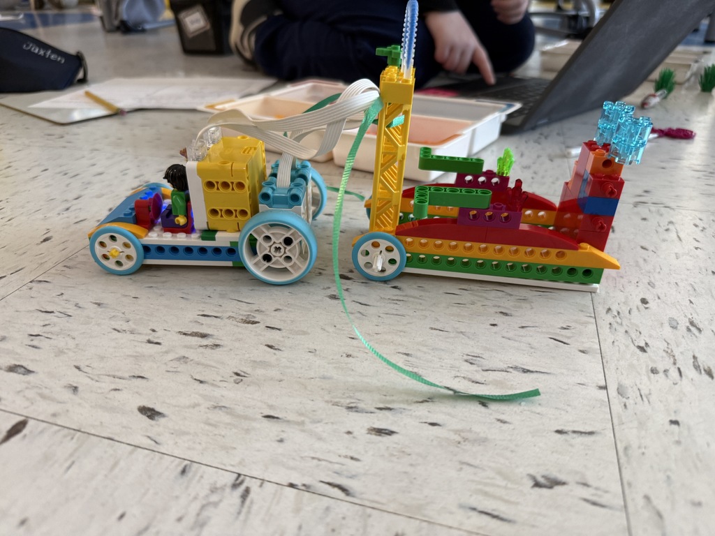 Lego robotics students design bots to tow animals who have been displaced. 