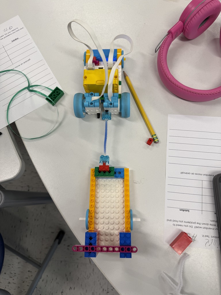Lego robotics students design bots to tow animals who have been displaced. 