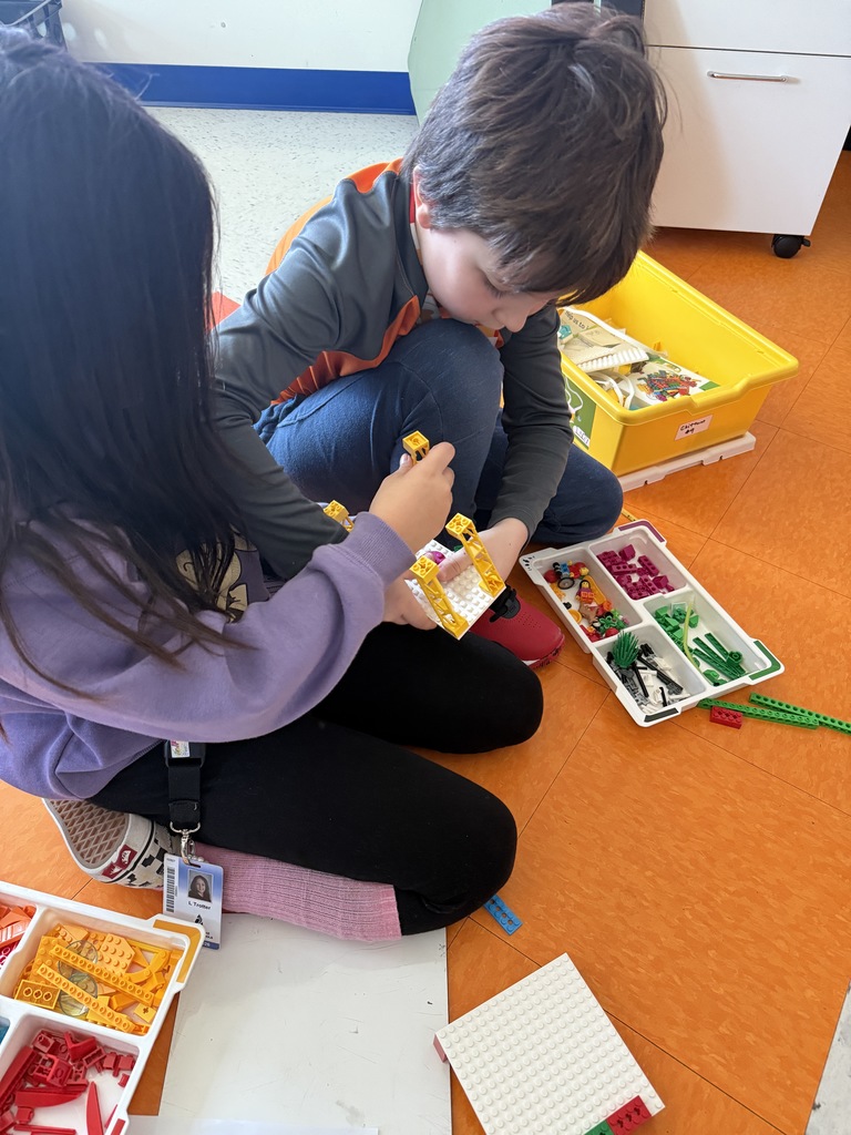 Lego robotics students design bots to tow animals who have been displaced. 