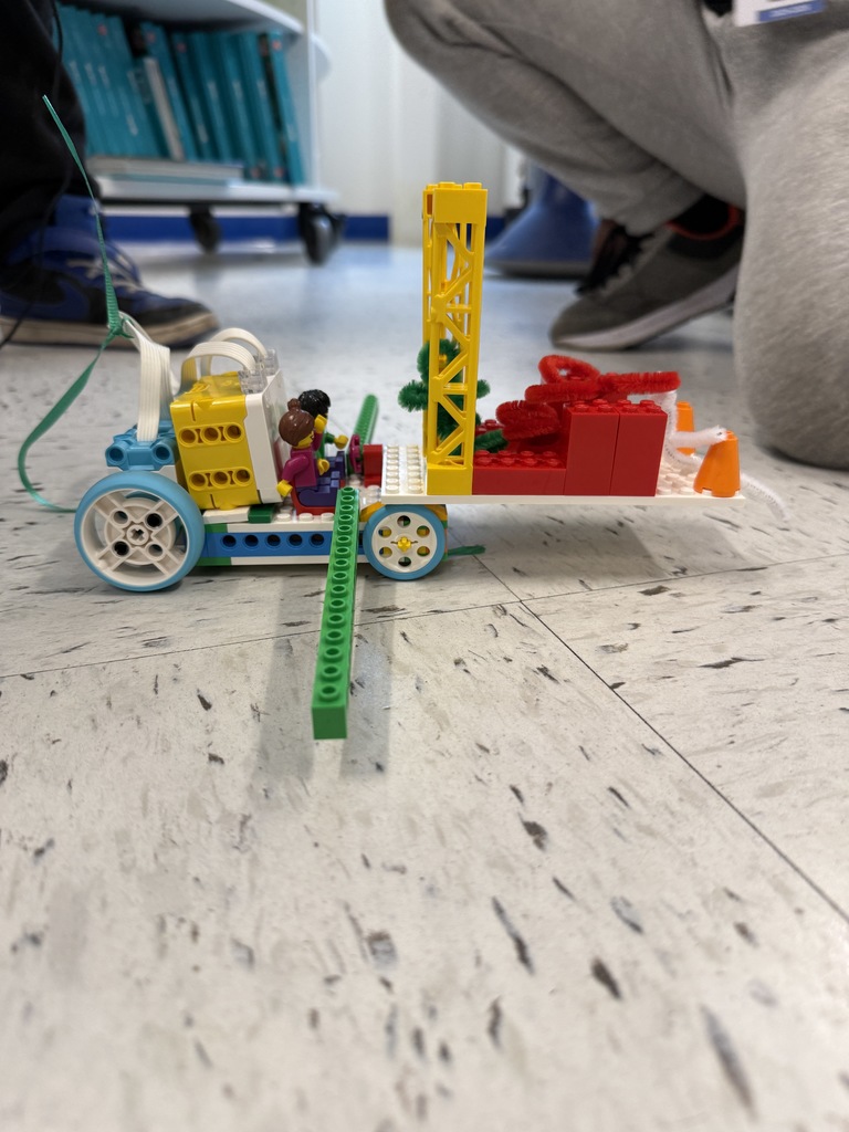 Lego robotics students design bots to tow animals who have been displaced. 