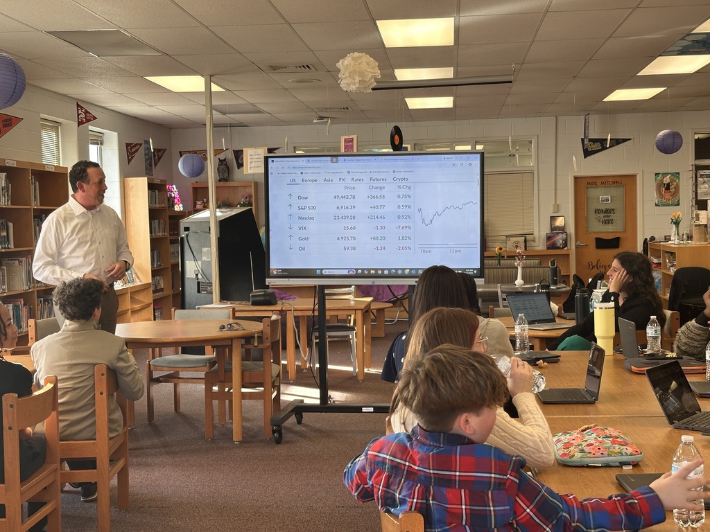 One of the Financial Integrated Partners talking with our FBLA students