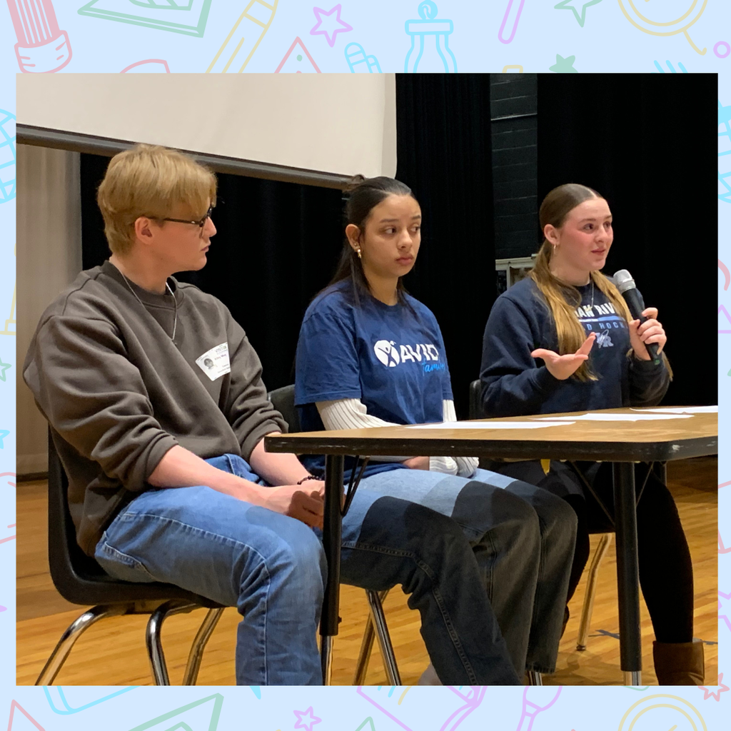 Three students on a panel at Greenbrier Middle School