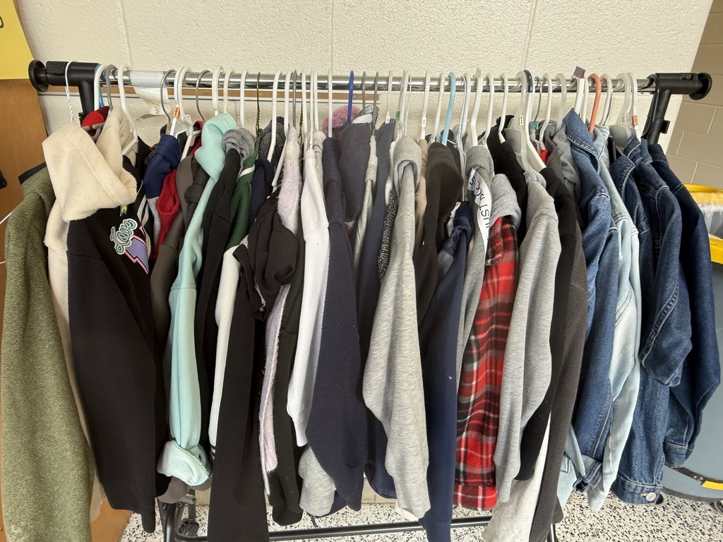 several coats and jackets in the lost and found