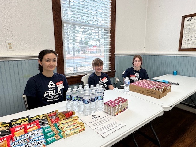 The FBLA club serving snacks at a blood drive.