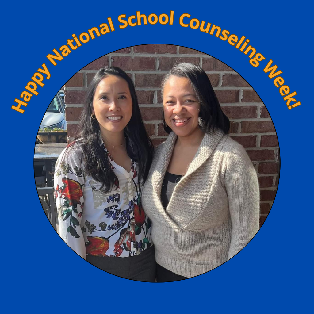 2 women, school counselors, smiling and posing 