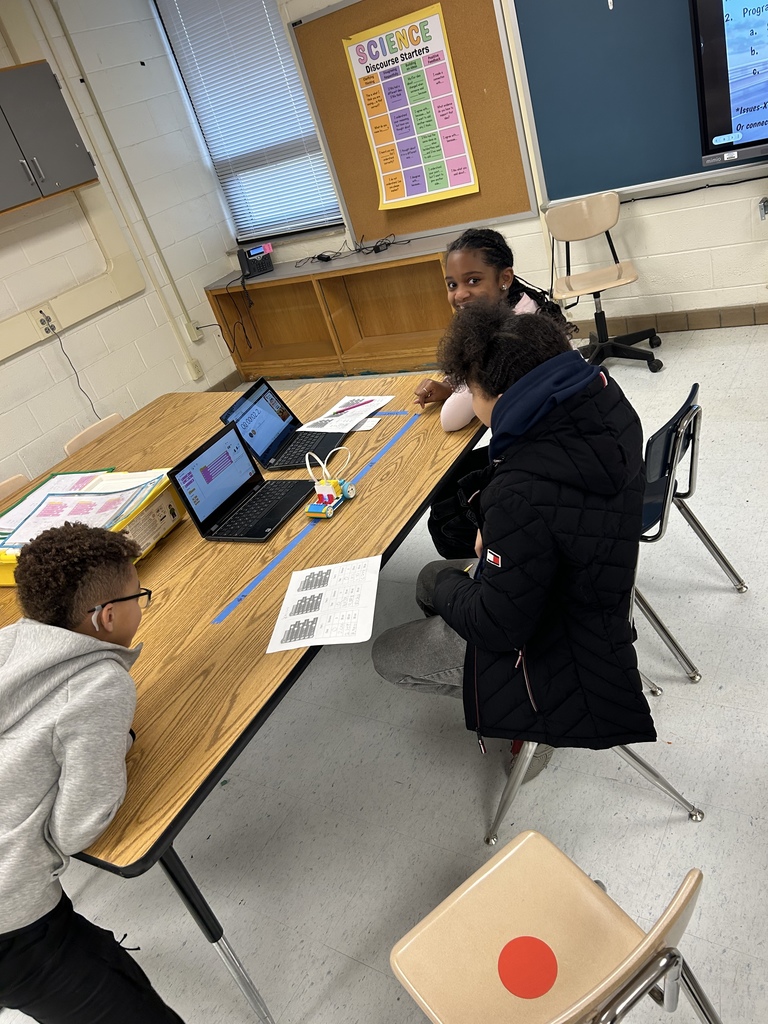 Three students working on the Lego Lab.