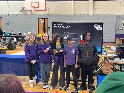 Five students with their awards.