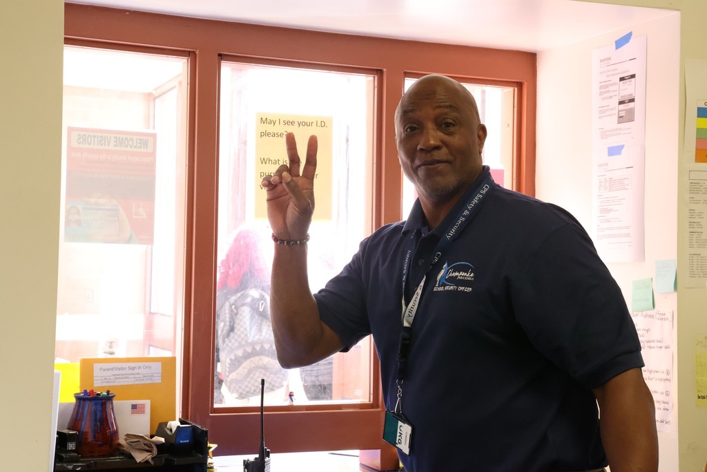 male SSO giving peace sign