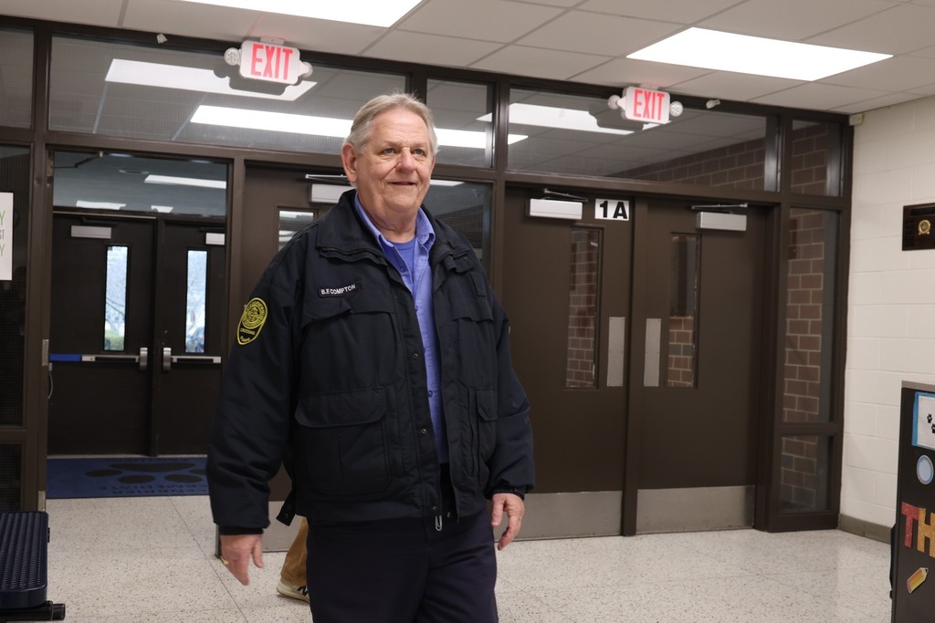 Tags Greenbrier Intermediate, Chesapeake Sheriff's Office Full length shot of Mr. Compton with CPS Administrators in hallway Mr. Compton smiling with 3 female principals from GRI Mr. Compton shaking hands and receiving award from Dawn Moore- Health and PE director for CPS Mr. Compton entering school back shot with adults cheering Crossing sign with blurry Mr. Compton in background directing traffic Mr. Compton entering school smiling as he is cheered for Mr. Compton image of back directing traffic Mr. Compton image from behind directing traffic Mr. Compton in hallway with mini bus and award smiling for camera MR. Compton Full Length pic in road directing traffic Mr. Compton in neon yellow in the road directing traffic. Whistle in mouth