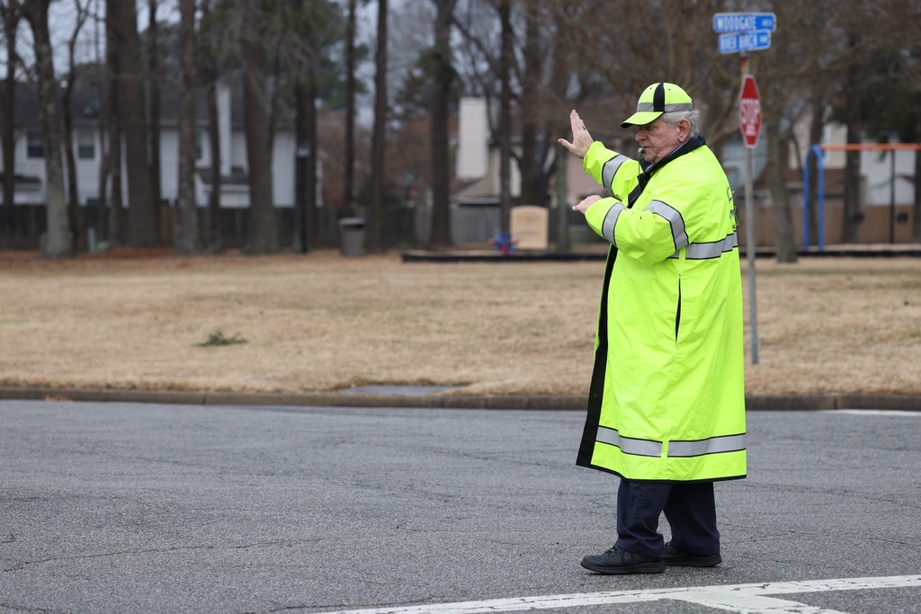 MR. Compton Full Length pic in road directing traffic