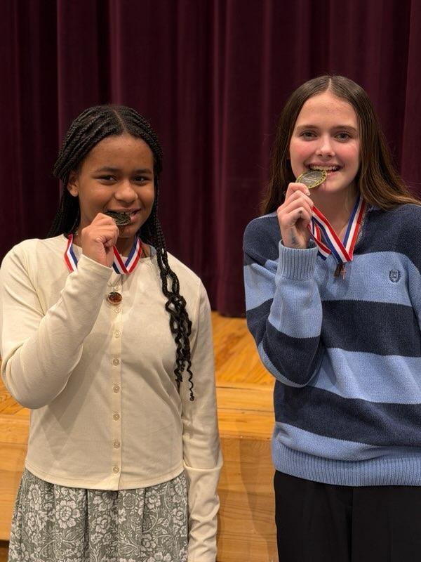 Speech students with trophy