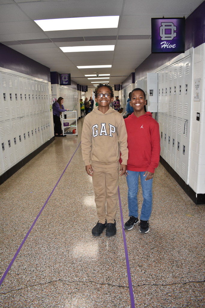 Two students showing their school spirit.